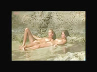 Here you will see even two nudist women that are entertaining and having the nudist fun at the desolate beach!